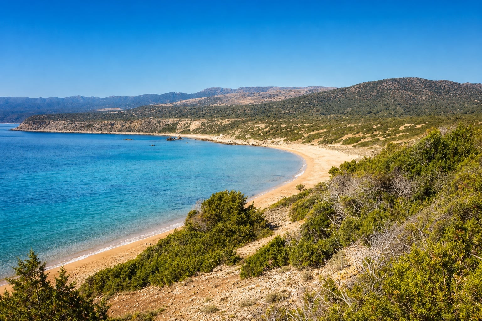 Quiet sand at Lara Beach between the natural hills of Akamas